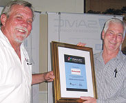 Pat Fowler of Honeywell (right) accepts the Patron Membership certificate from Hennie Prinsloo.
